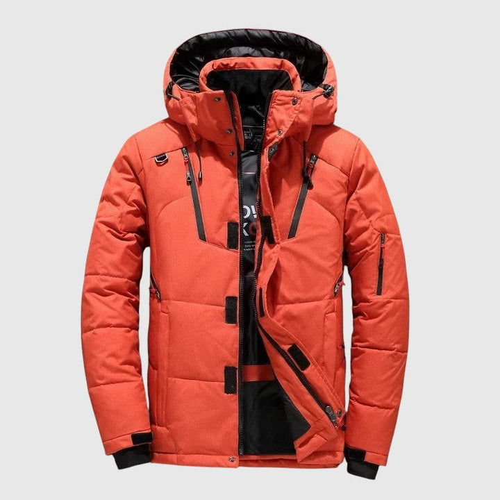 Αντρέ – Φουσκωτό μπουφάν με κουκούλα και τεχνικές λεπτομέρειες