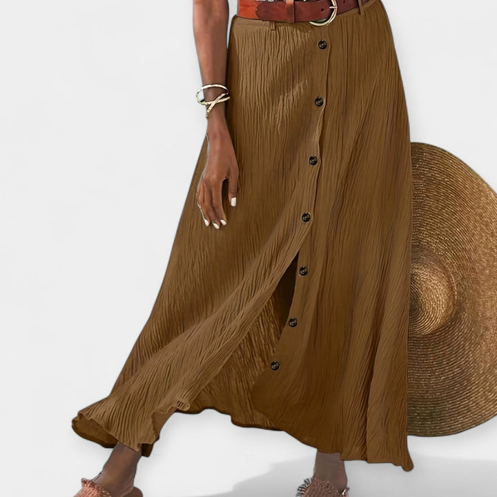 Ημιδιαφανής μίντι φούστα με σκίσιμο